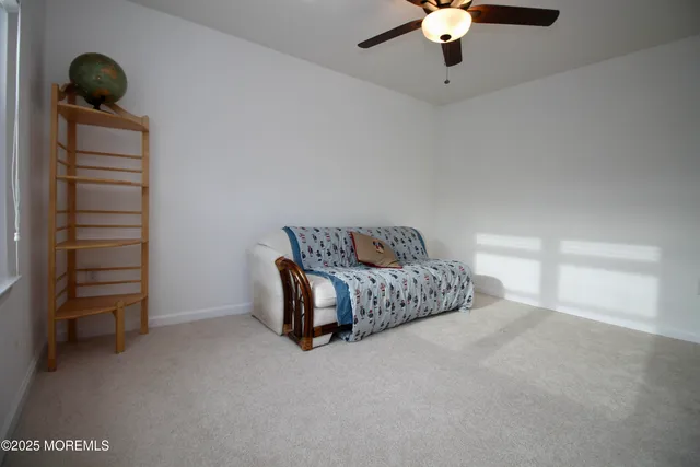 a view of a house with wooden deck