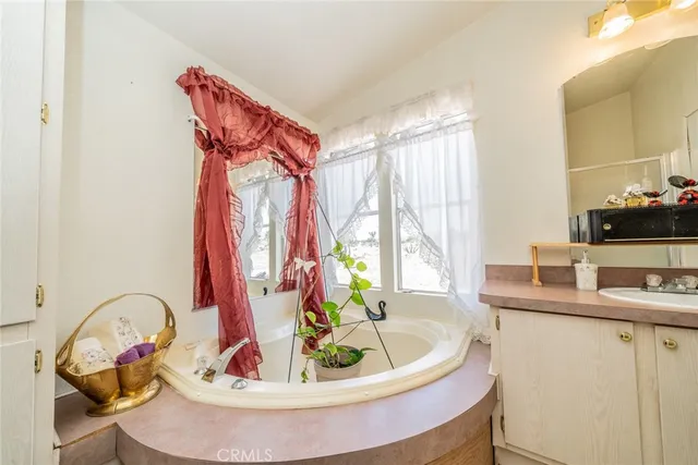 a dining room with a table and a chandelier