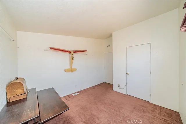 a view of workspace with lounge chair