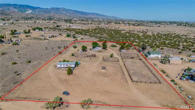 an aerial view of beach and ocean