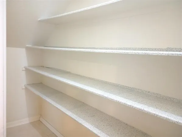 a view of small space with racks on the wall