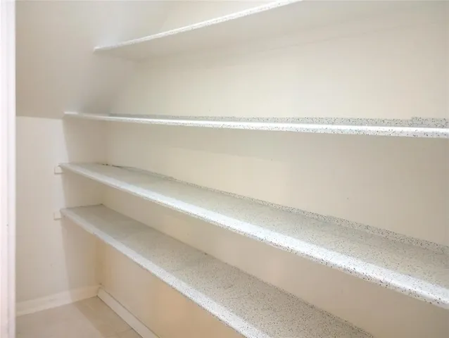 a view of small space with racks on the wall