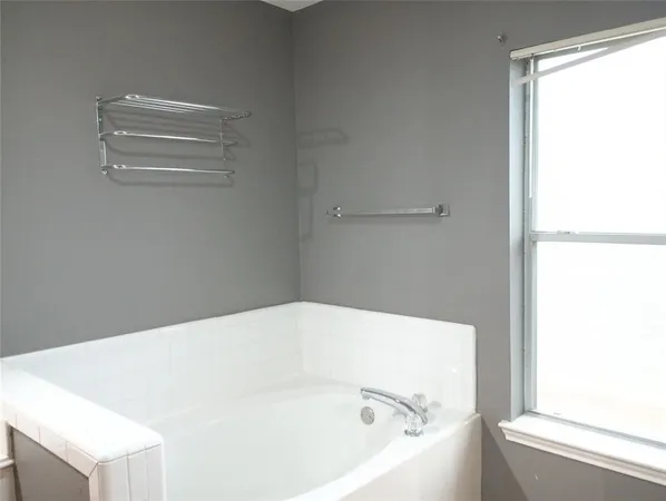 a bathroom with a bathtub