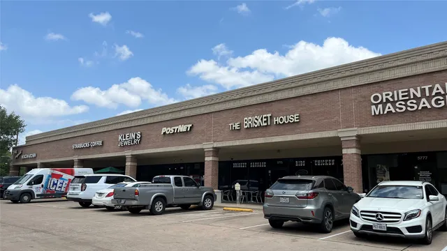a car parked in front of a building