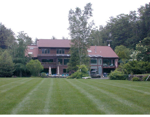 65 South Great Road Lincoln, MA 01773 - Photo 1 of 2 a view of a big house with a big yard and large trees