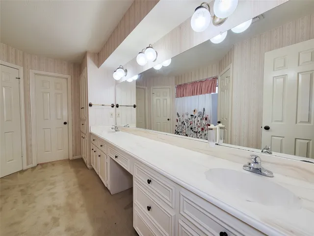 a view of a room with dryer on the wall