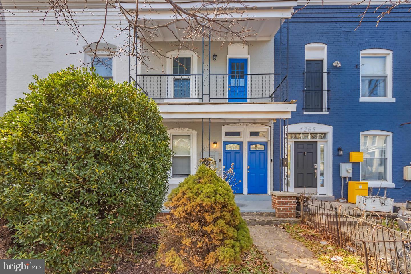 1267 Morse Street Northeast Washington, DC 20002 - Photo 2 of 14 Charming urban duplex with vibrant doors.