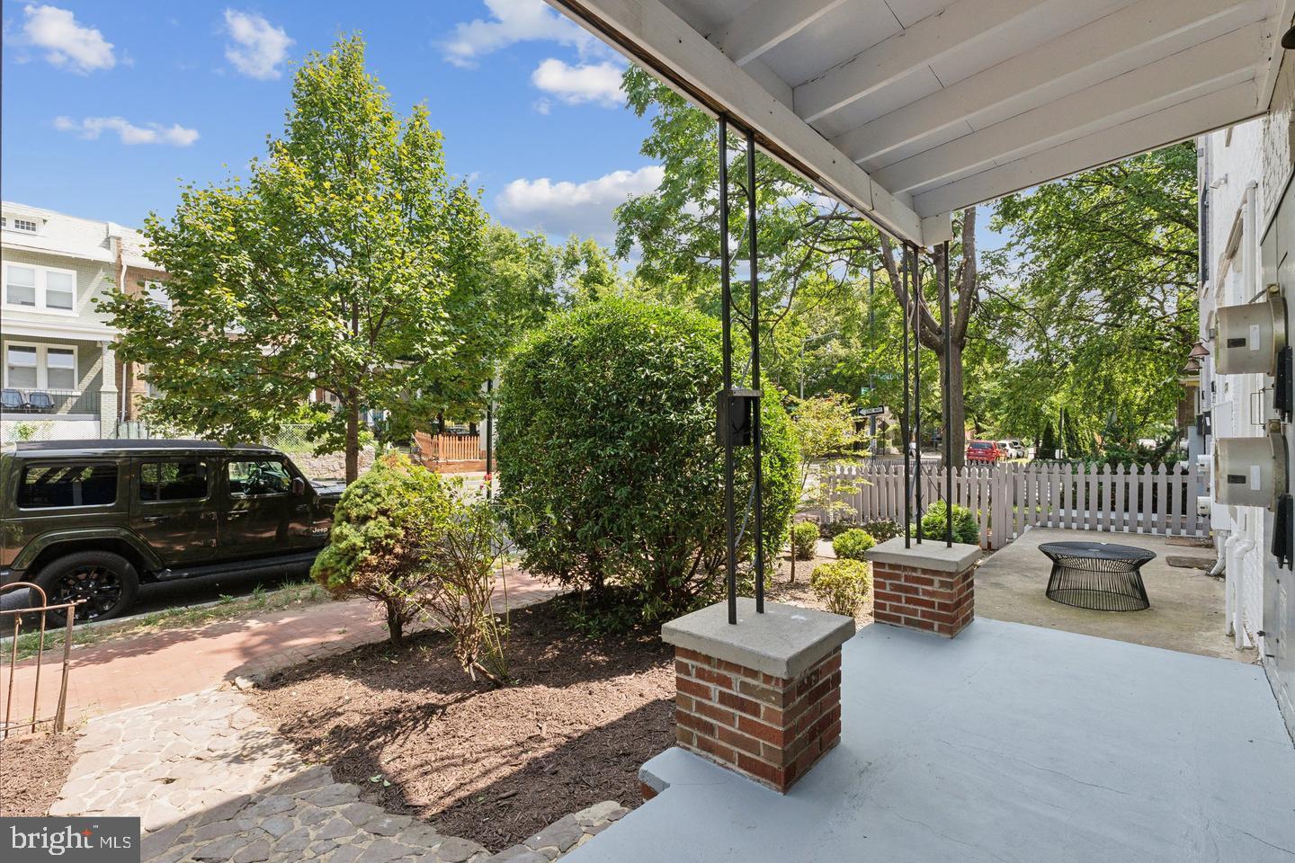 1267 Morse Street Northeast Washington, DC 20002 - Photo 3 of 14 Charming entryway with lush greenery.