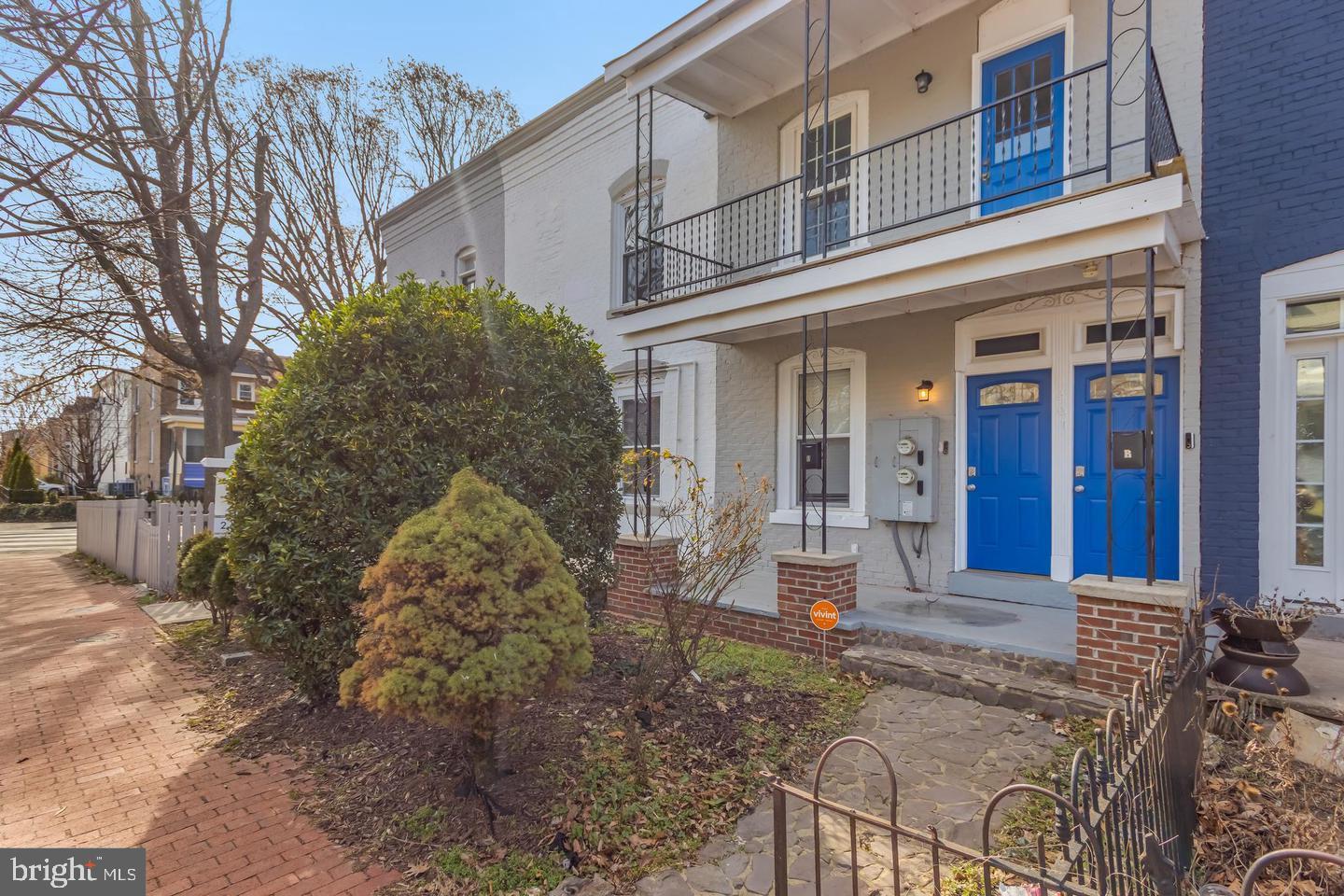 1267 Morse Street Northeast Washington, DC 20002 - Photo 4 of 14 Charming duplex with vibrant blue doors.