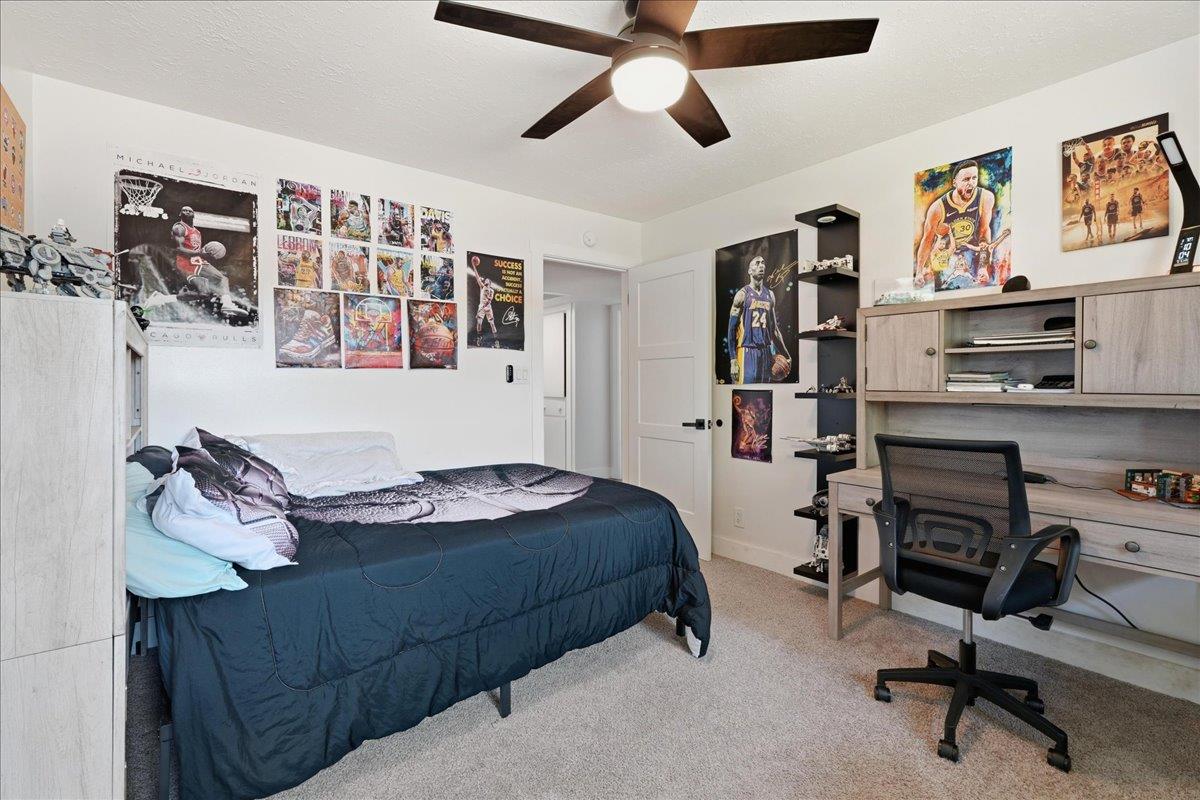 4849 Alexon Way Carmichael, CA 95608 - Photo 25 of 50 a bedroom with a bed and furniture