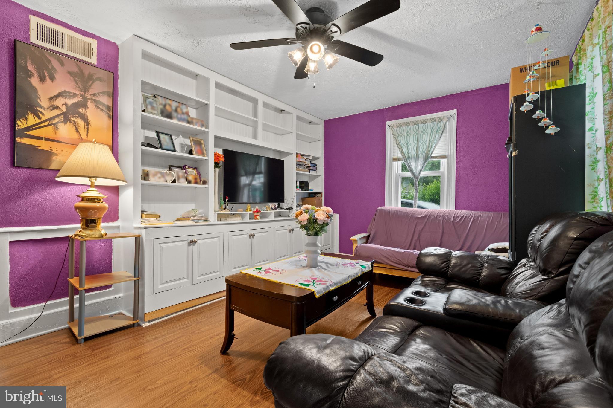4410 Allies Road Suitland, MD 20746 - Photo 6 of 30 a living room with furniture and a flat screen tv