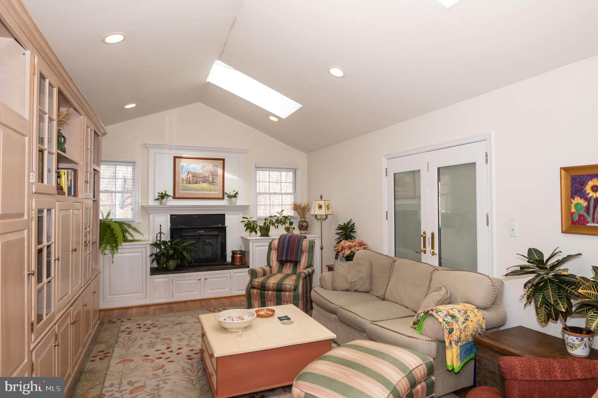 540 Ashland Ridge Road Hockessin, DE 19707 - Photo 11 of 30 Vaulted and skylit family room with wood stove