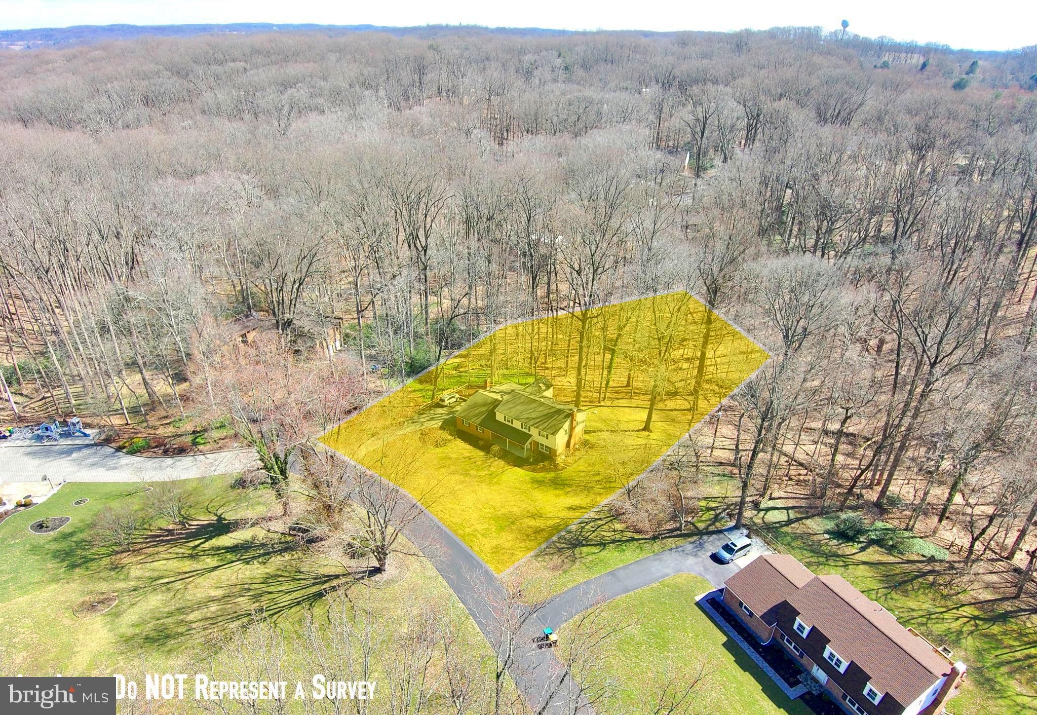 Aerial photo approximates rear lot line in woods
