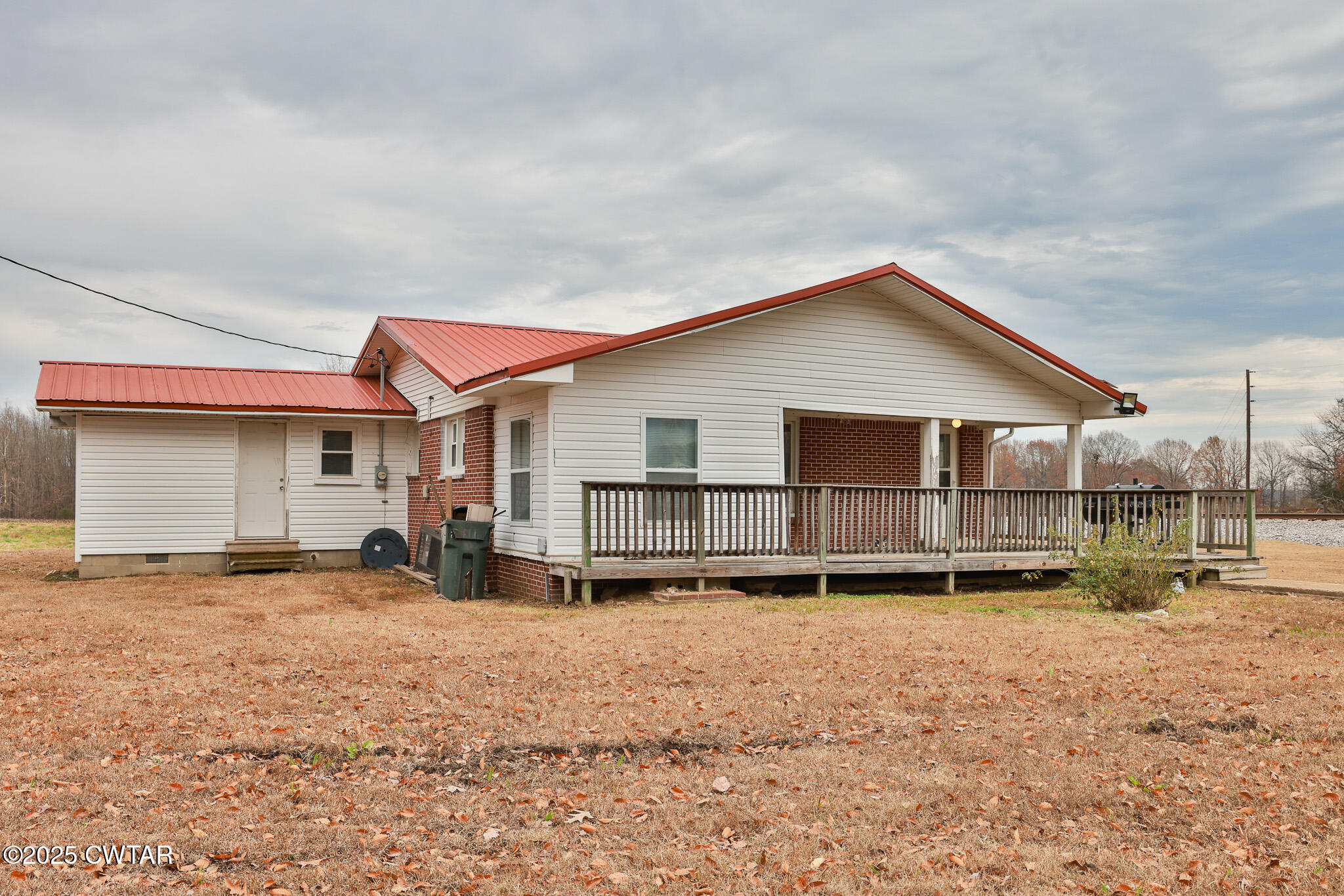 20 Seaboard Lane McKenzie, TN 38201 - Photo 15 of 29 a front view of a house with a yard and garage