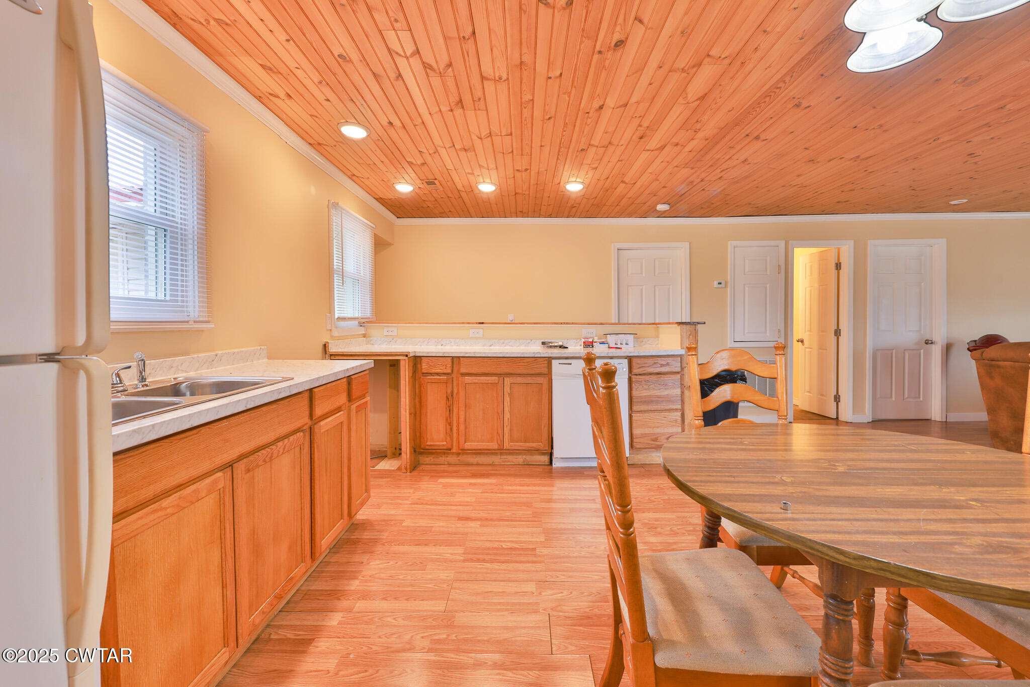 20 Seaboard Lane McKenzie, TN 38201 - Photo 20 of 29 a view of a kitchen with dining room and wooden floor