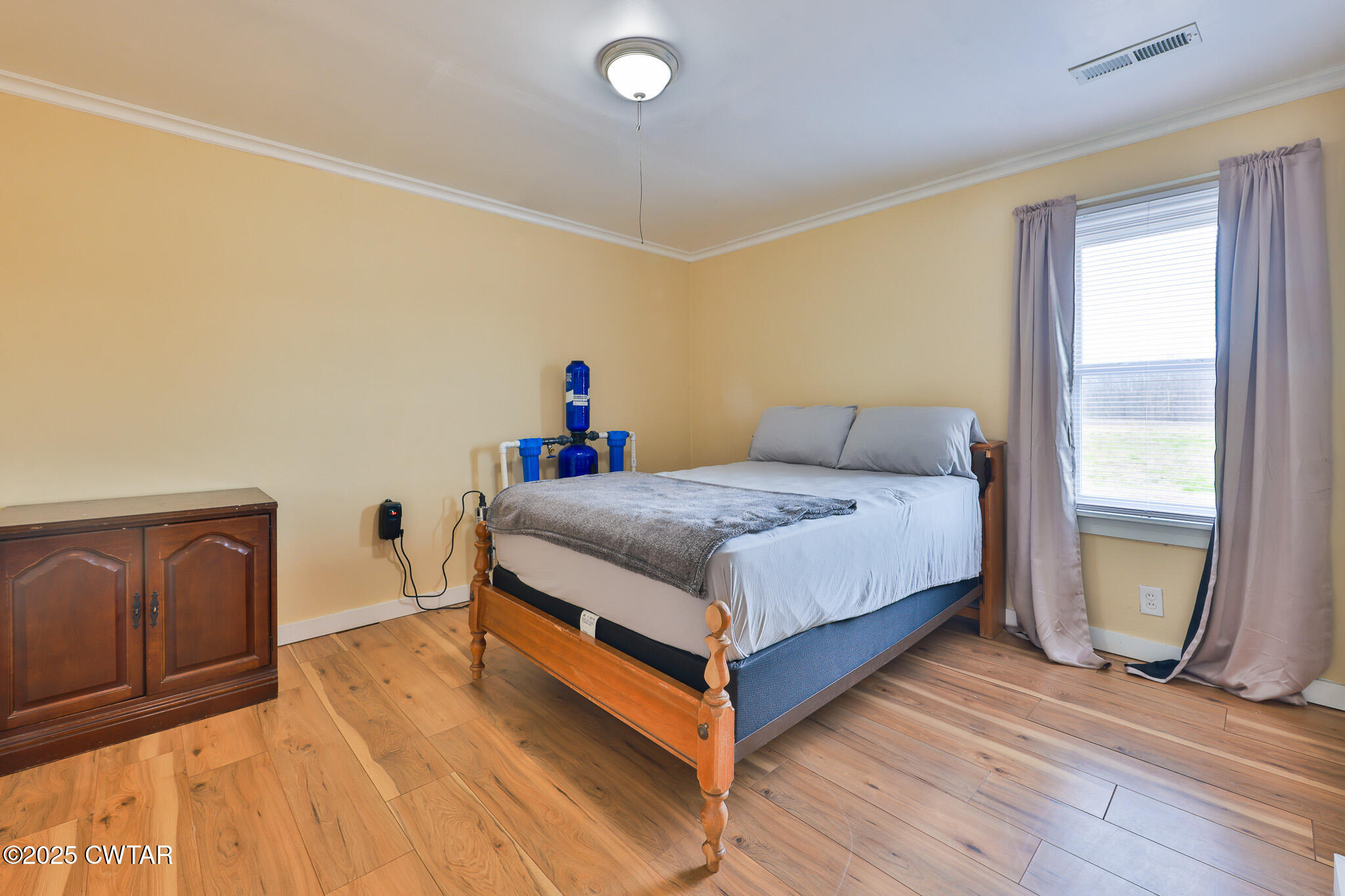 20 Seaboard Lane McKenzie, TN 38201 - Photo 23 of 29 a bedroom with a bed and window