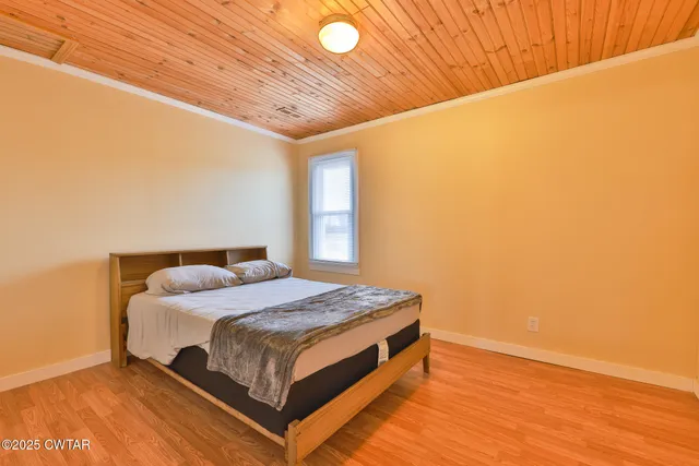 a view of a kitchen from a hallway