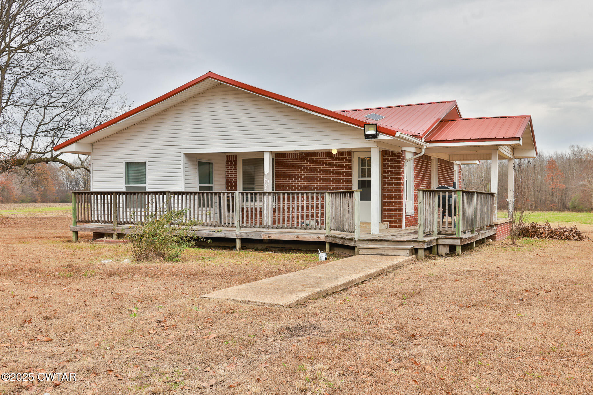 20 Seaboard Lane McKenzie, TN 38201 - Photo 3 of 29 a view of a house with backyard and sitting area