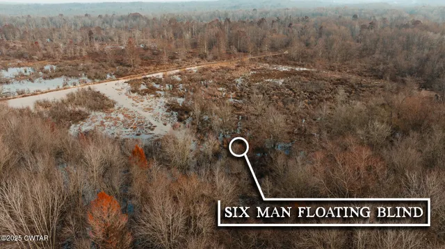 a view of water heater and trees