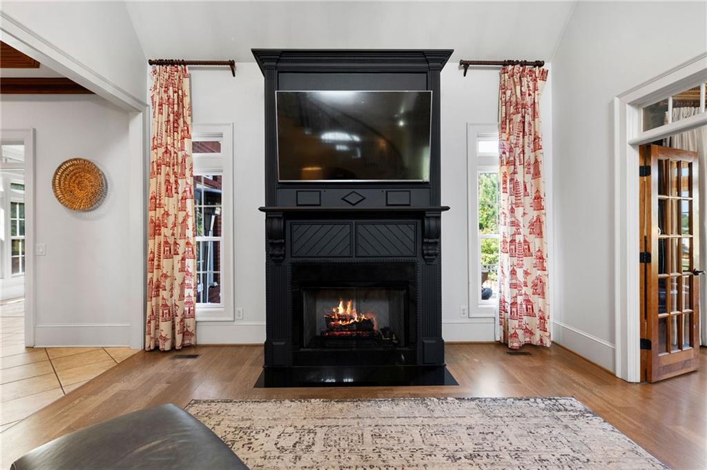 113 Vogel Street Calhoun, GA 30701 - Photo 18 of 65 a living room with a fireplace and a fireplace