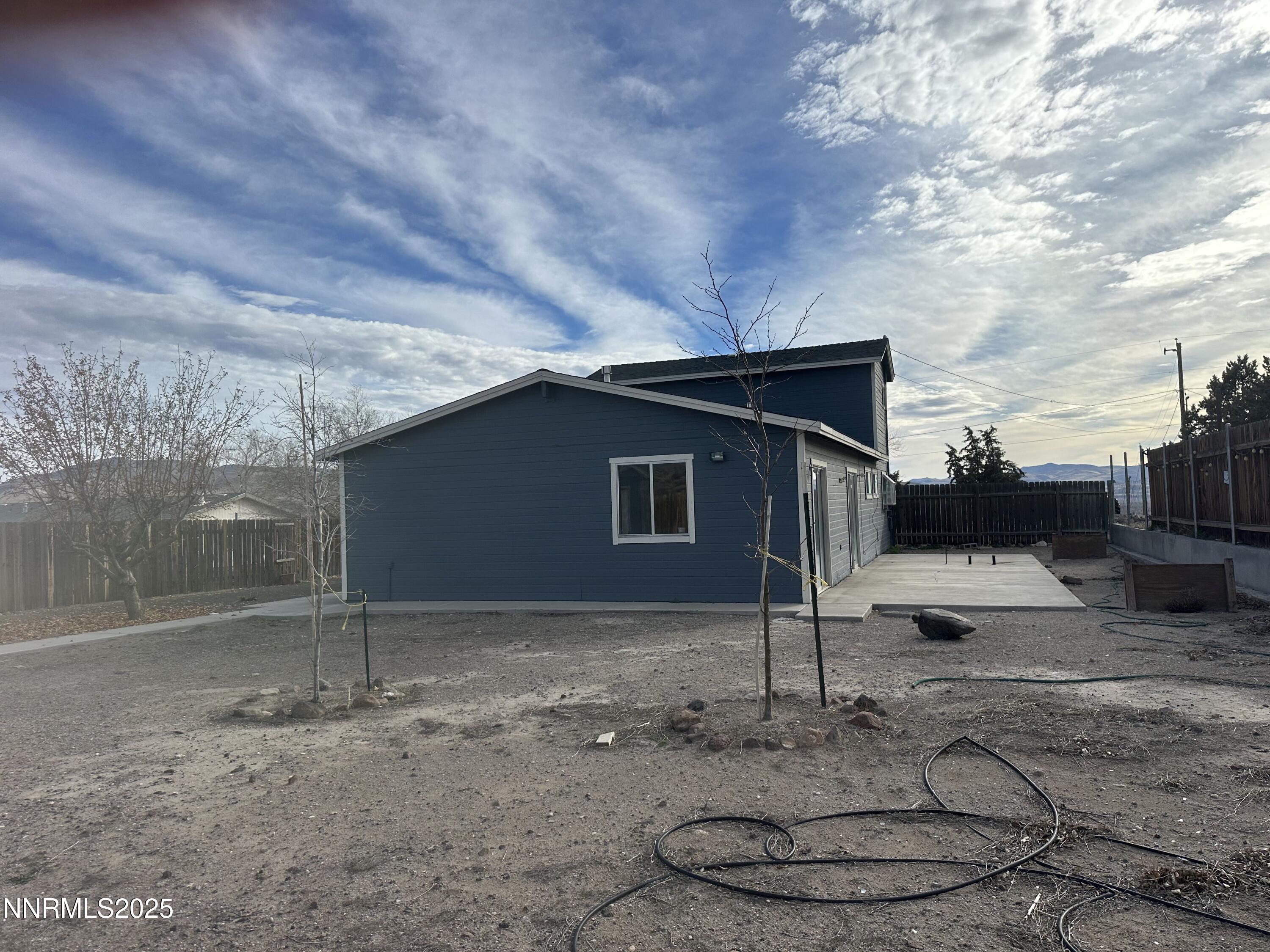 7710 Cheyenne Trail Stagecoach, NV 89429 - Photo 4 of 14 a backyard of a house