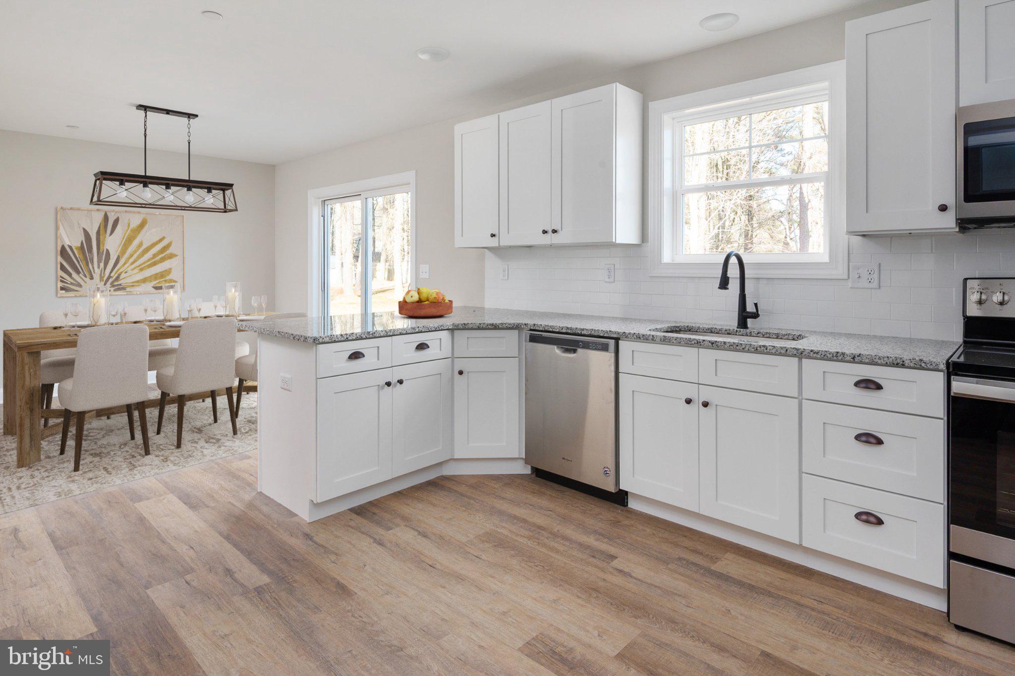309 Talbot Road Stevensville, MD 21666 - Photo 11 of 26 Bright and airy modern kitchen space.