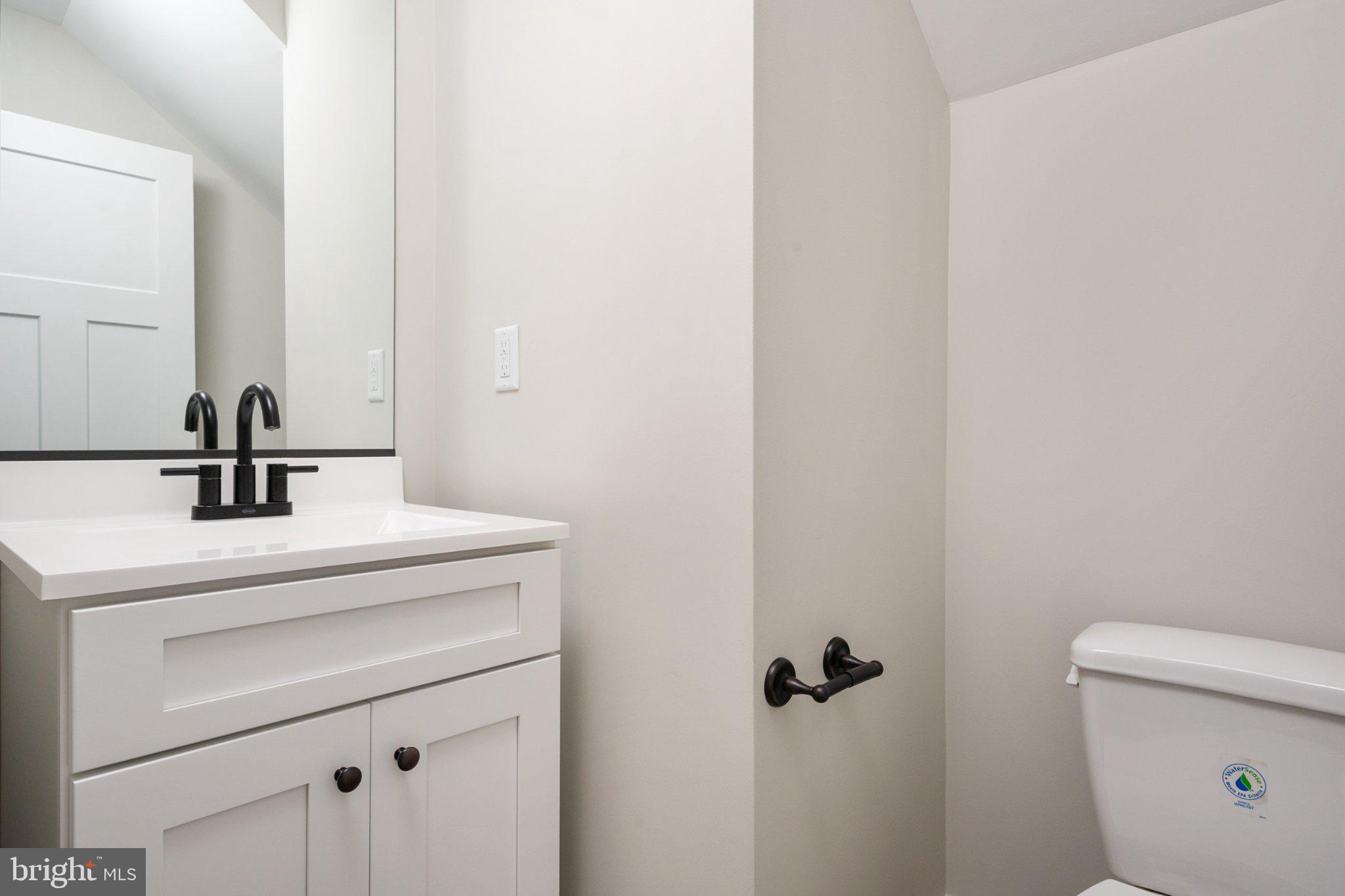 309 Talbot Road Stevensville, MD 21666 - Photo 13 of 26 Sleek and modern bathroom retreat.