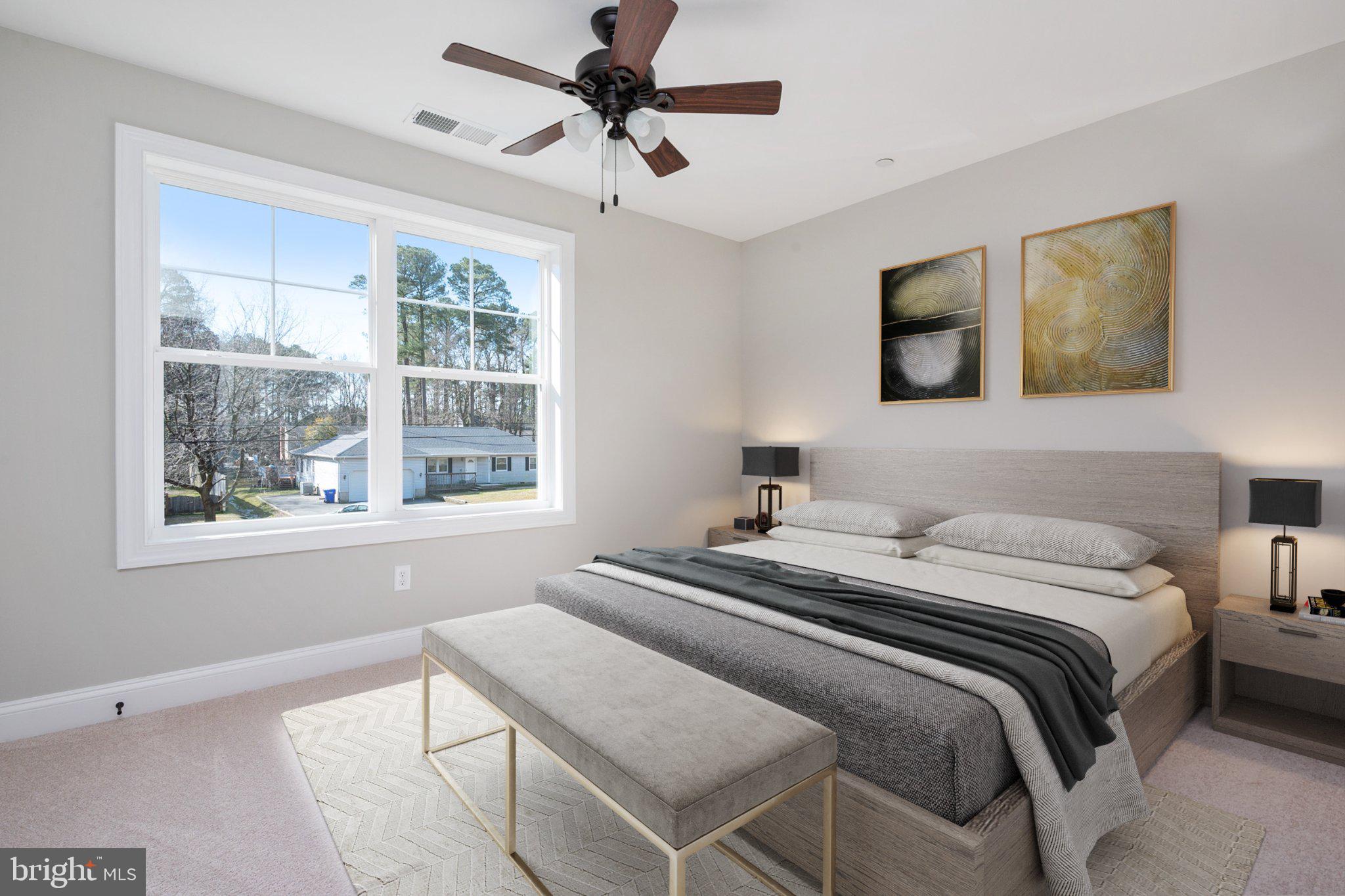 309 Talbot Road Stevensville, MD 21666 - Photo 15 of 26 Serene bedroom with natural light.