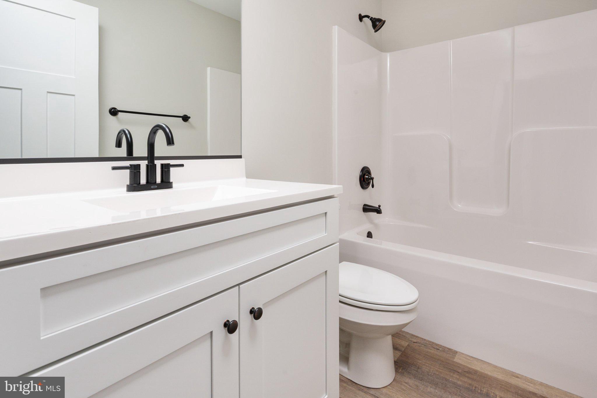 309 Talbot Road Stevensville, MD 21666 - Photo 18 of 26 Sleek modern bathroom retreat.