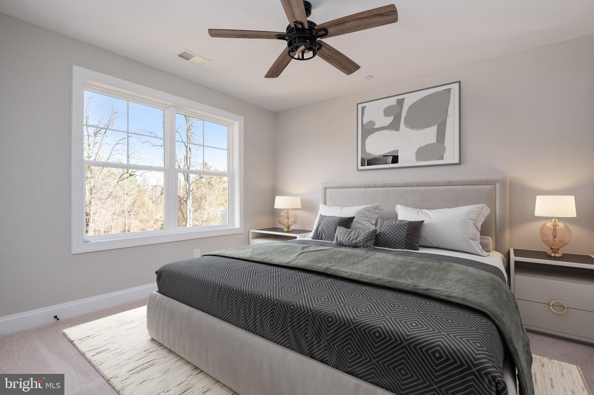 309 Talbot Road Stevensville, MD 21666 - Photo 19 of 26 Serene bedroom with natural light.