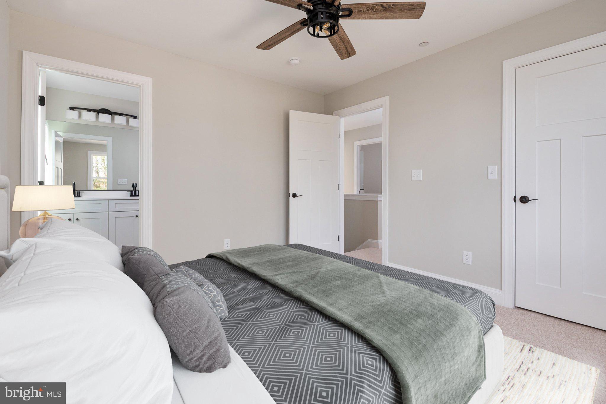 309 Talbot Road Stevensville, MD 21666 - Photo 20 of 26 Serene bedroom with modern charm.
