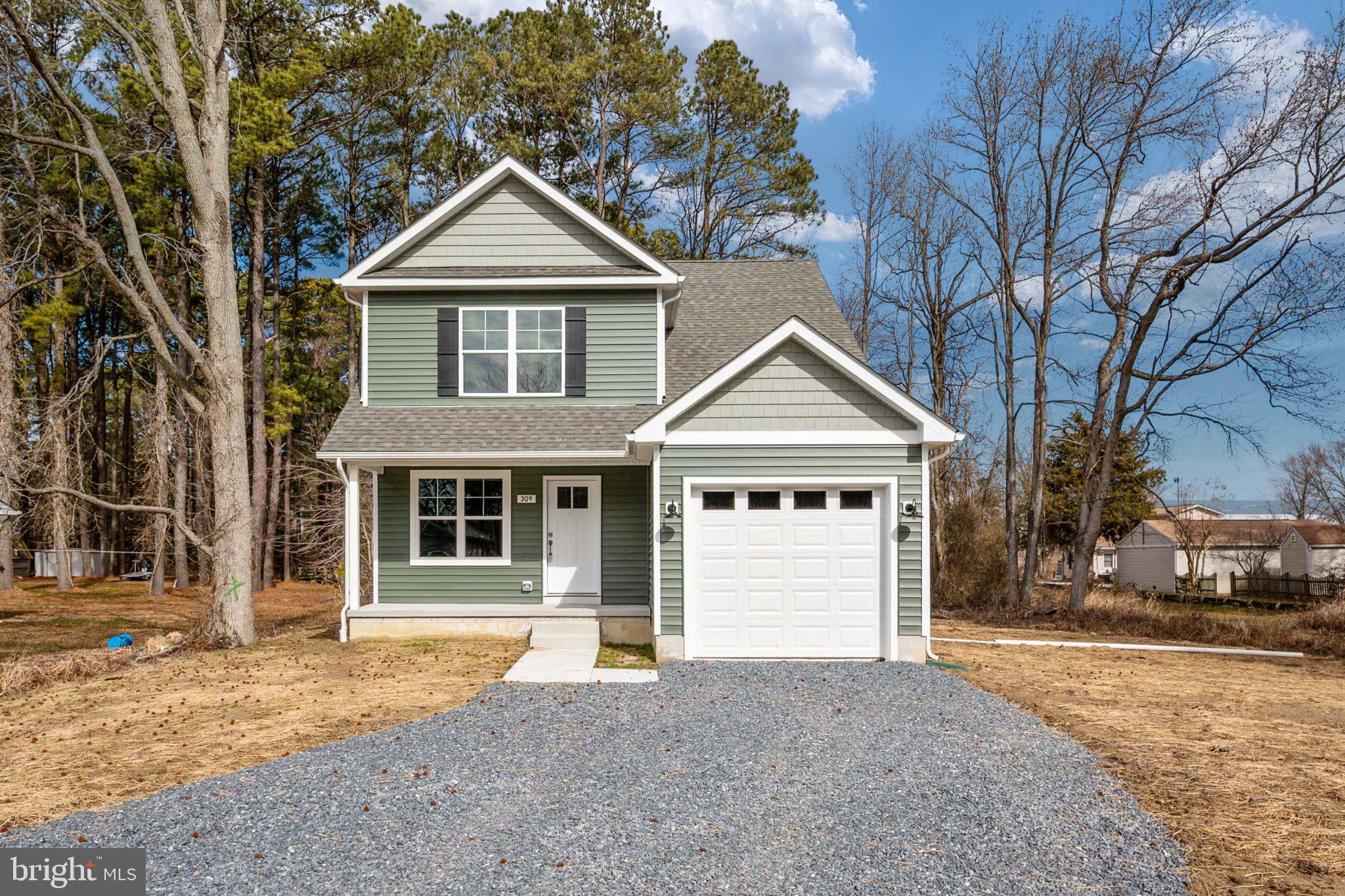 309 Talbot Road Stevensville, MD 21666 - Photo 2 of 26 Charming home nestled in nature's embrace.
