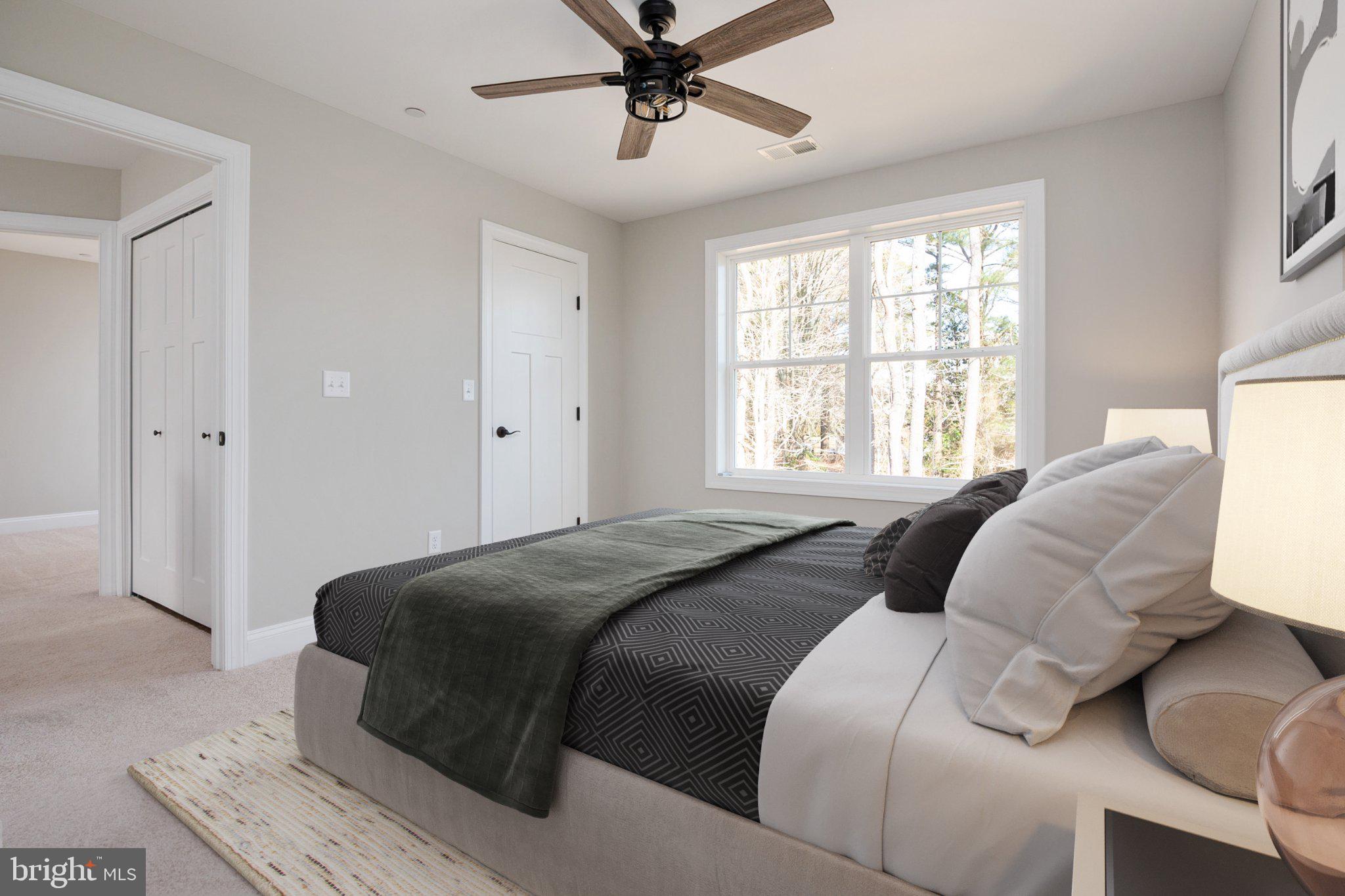 309 Talbot Road Stevensville, MD 21666 - Photo 21 of 26 Serene bedroom with natural light.