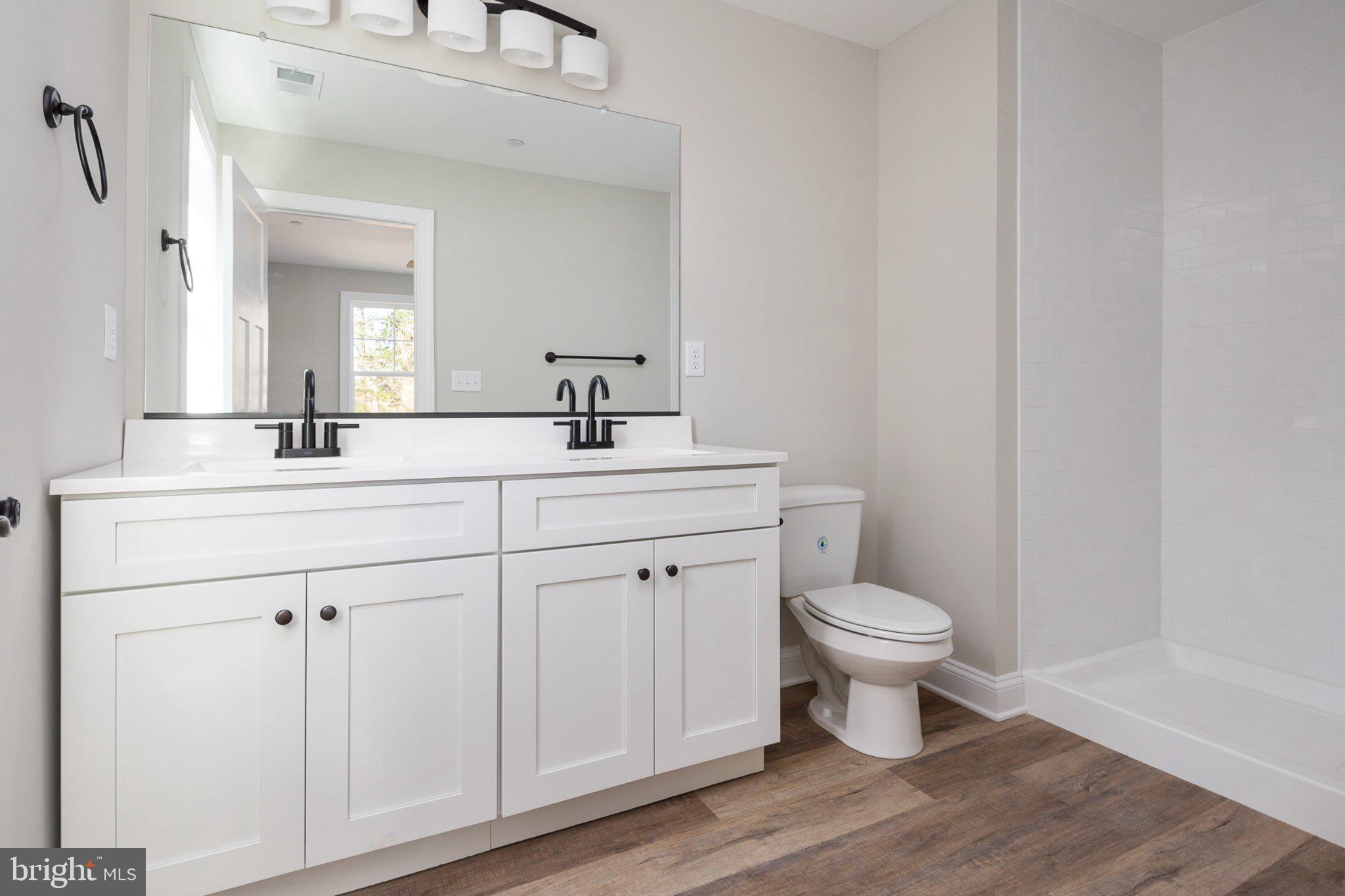 309 Talbot Road Stevensville, MD 21666 - Photo 22 of 26 Sleek modern bathroom with elegance.
