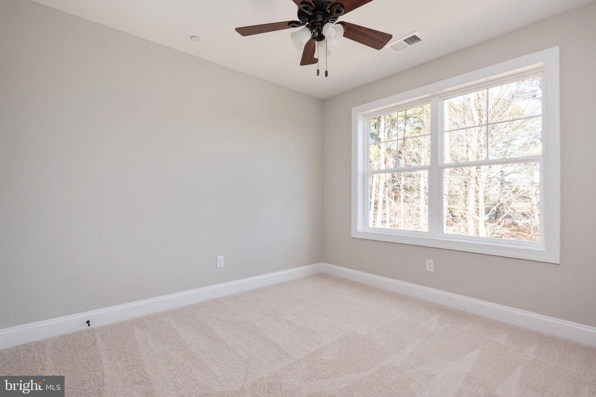 309 Talbot Road Stevensville, MD 21666 - Photo 24 of 26 Bright and airy bedroom retreat.