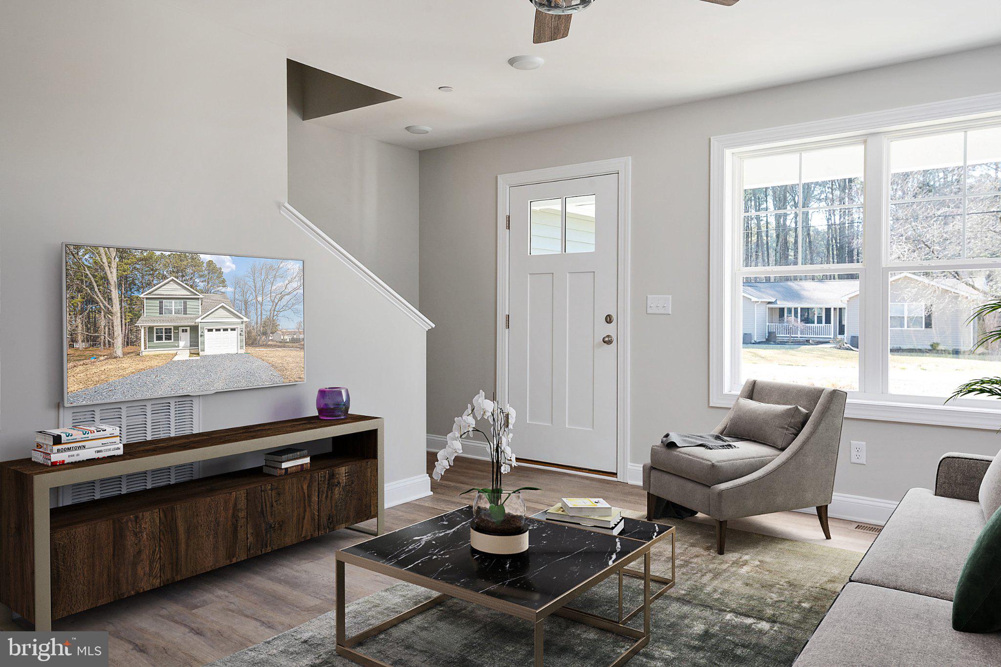 309 Talbot Road Stevensville, MD 21666 - Photo 5 of 26 Modern living space with natural light.