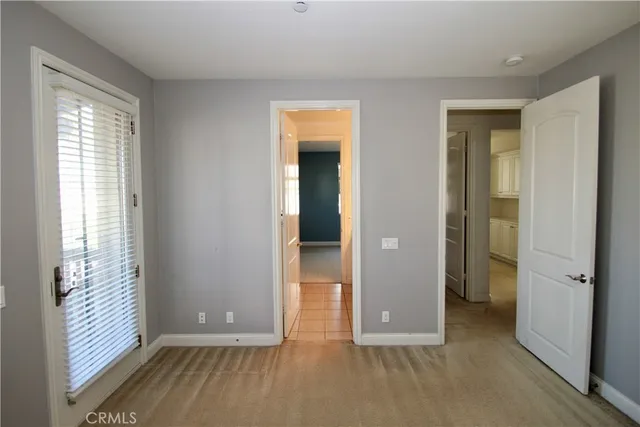 a bathroom with a double vanity sink mirror and shower