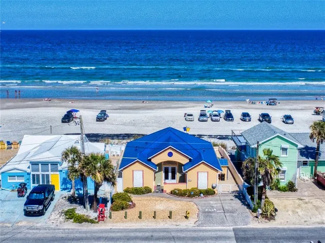a view of multiple houses with a street