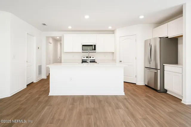 an aerial view of a swimming pool and outdoor space