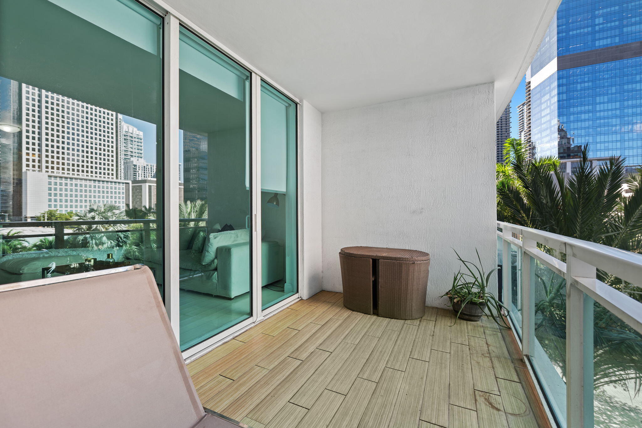 951 Brickell Avenue, Unit 400 Miami, FL 33131 - Photo 27 of 40 a view of backyard with potted plants and wooden floor