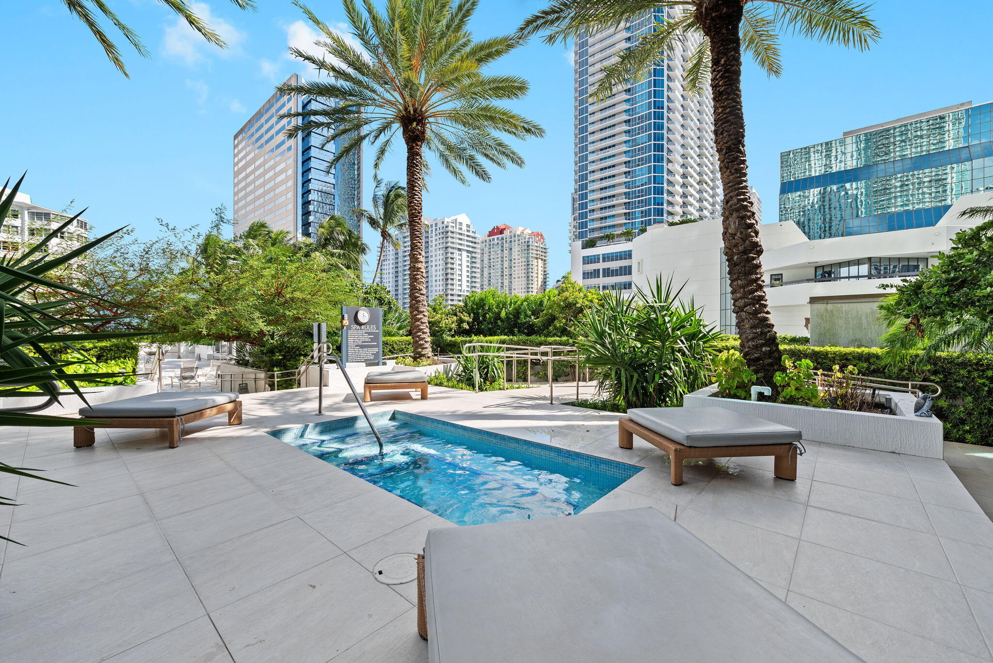 951 Brickell Avenue, Unit 400 Miami, FL 33131 - Photo 33 of 40 a view of a patio with couches and a fire pit