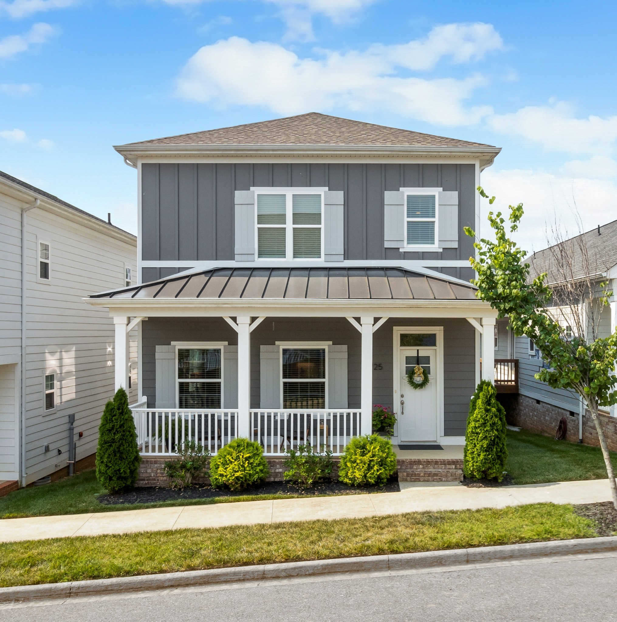 a front view of a house with a porch
