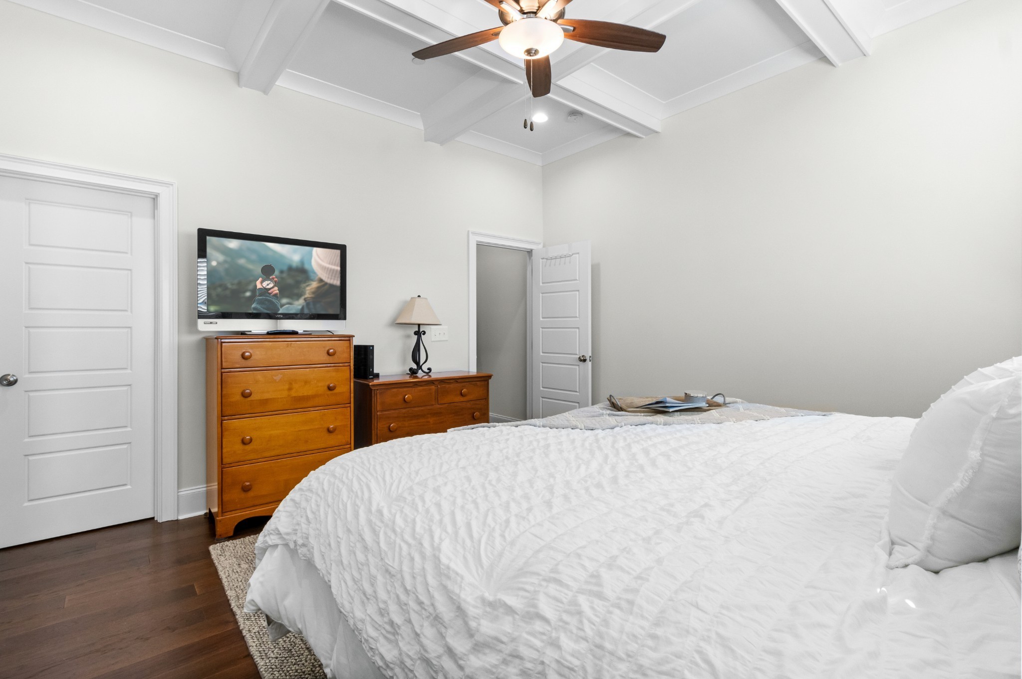 725 Centre Street Pleasant View, TN 37146 - Photo 19 of 44 a bedroom with a bed and wooden floor