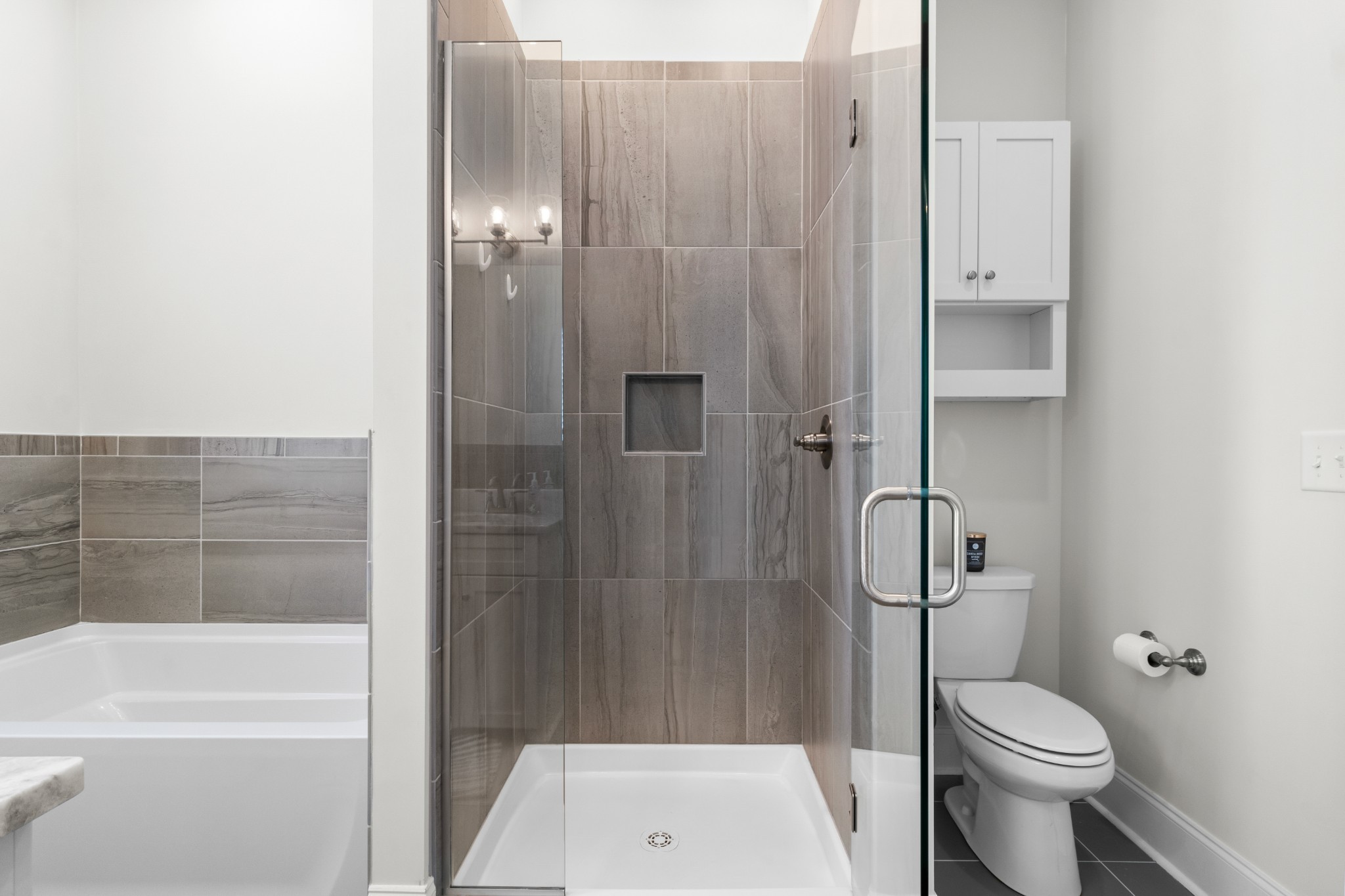 725 Centre Street Pleasant View, TN 37146 - Photo 20 of 44 a bathroom with a toilet and a shower