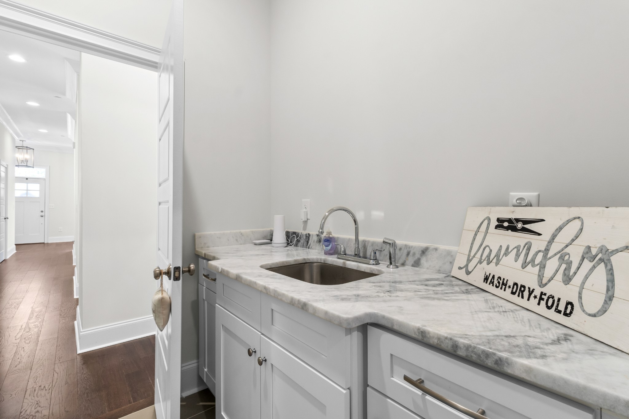 725 Centre Street Pleasant View, TN 37146 - Photo 23 of 44 a bathroom with a granite countertop sink and a mirror