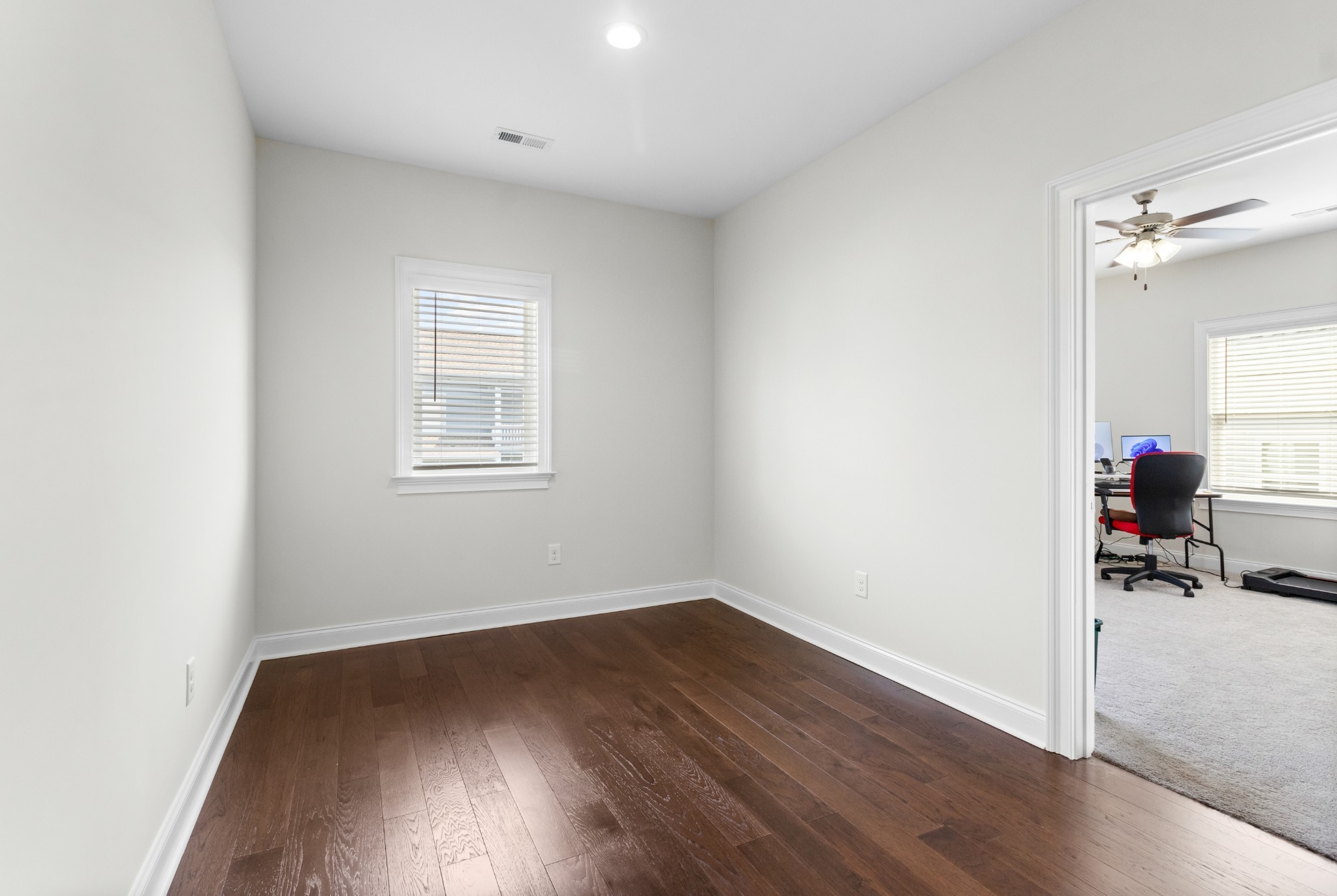 725 Centre Street Pleasant View, TN 37146 - Photo 25 of 44 an empty room with a hardwood and a window