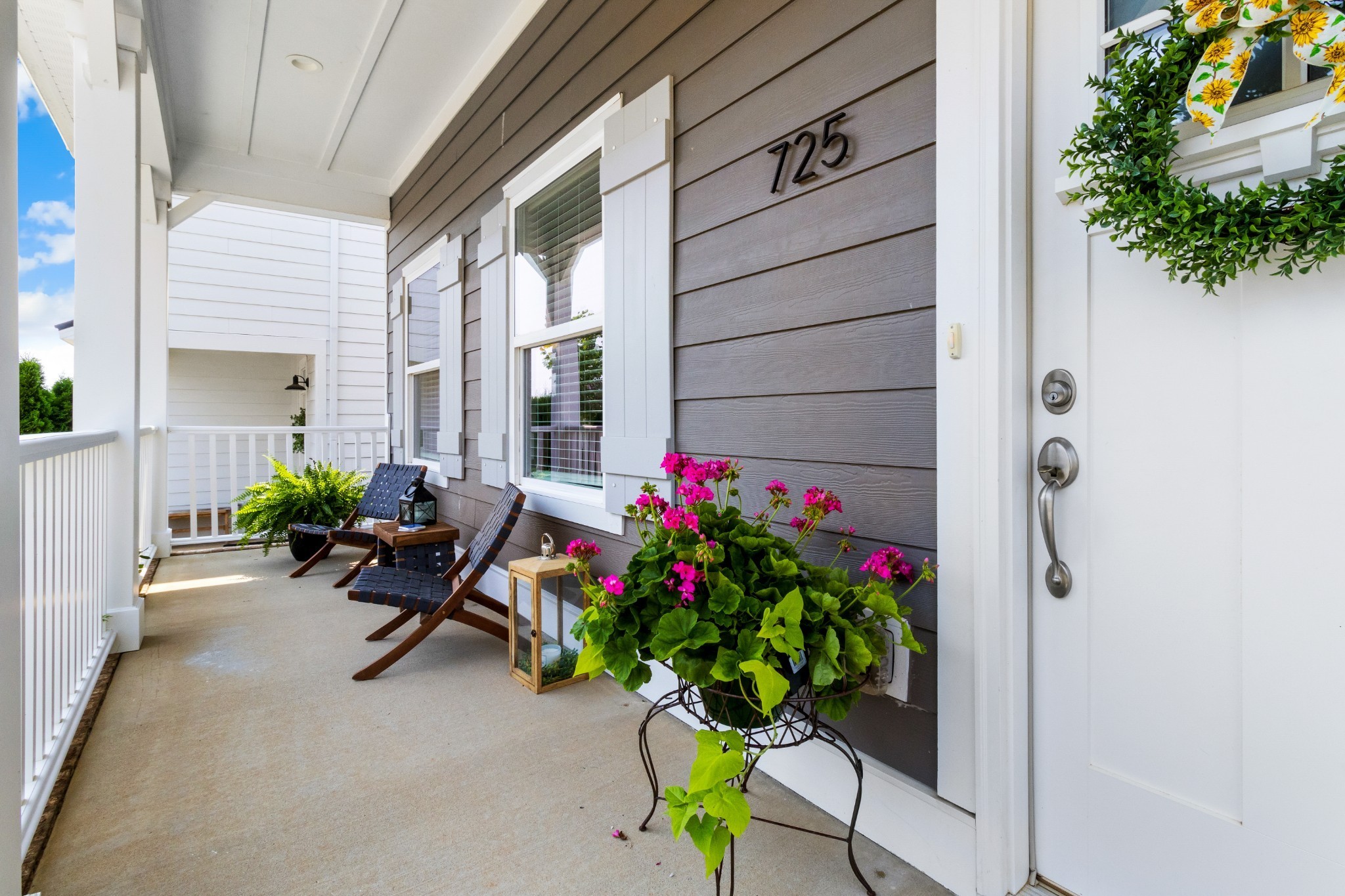 725 Centre Street Pleasant View, TN 37146 - Photo 5 of 44 a potted plant sitting in front of a house