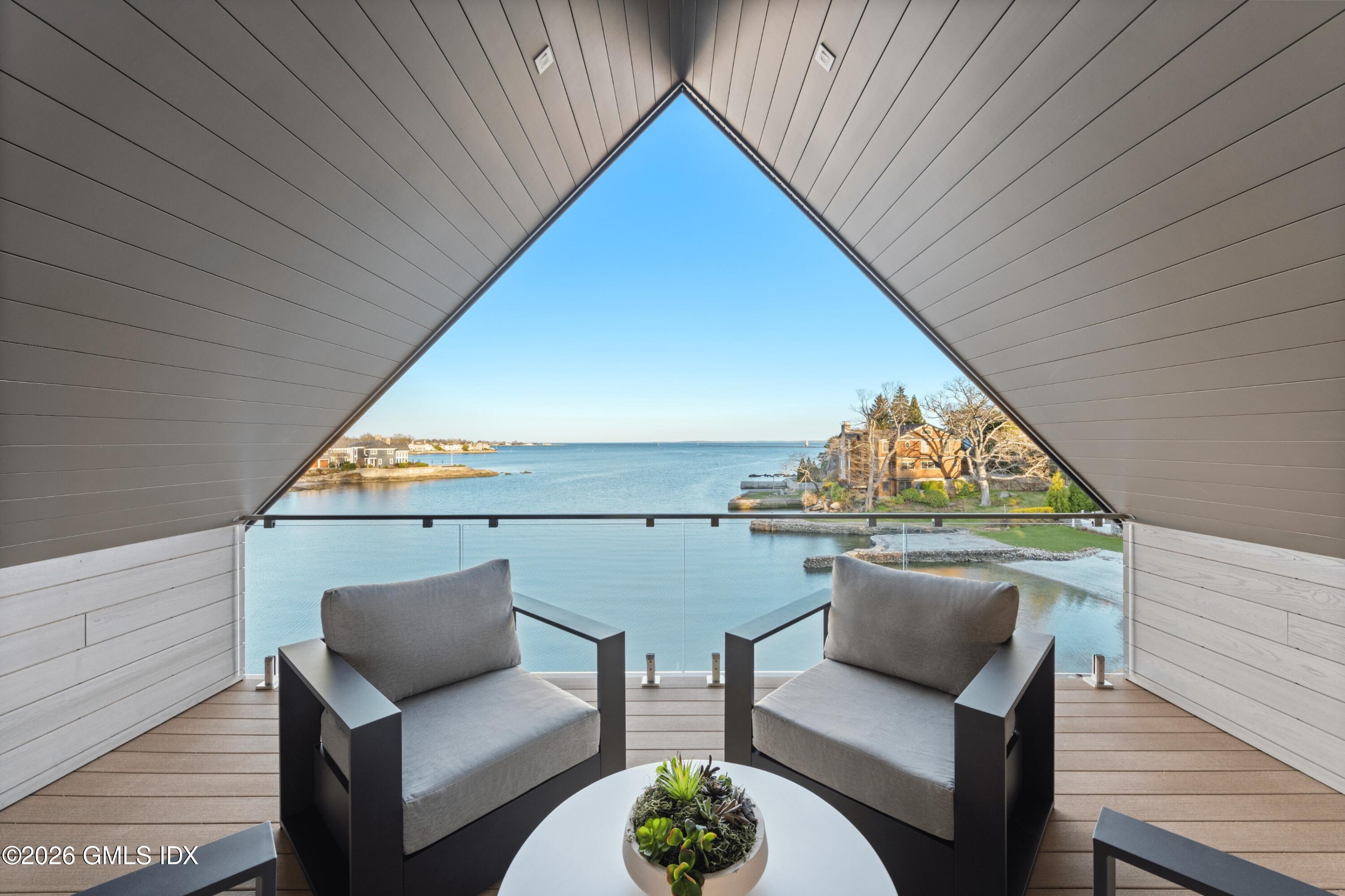 58 Shore Road Old Greenwich, CT 06870 - Photo 58 of 86 a outdoor living space with furniture and view of outdoor