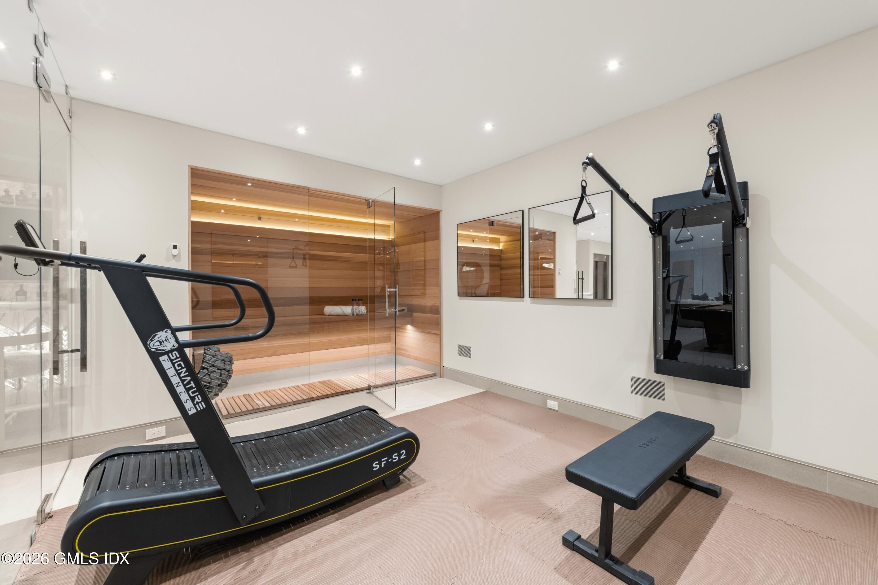 58 Shore Road Old Greenwich, CT 06870 - Photo 73 of 86 a room with gym equipment