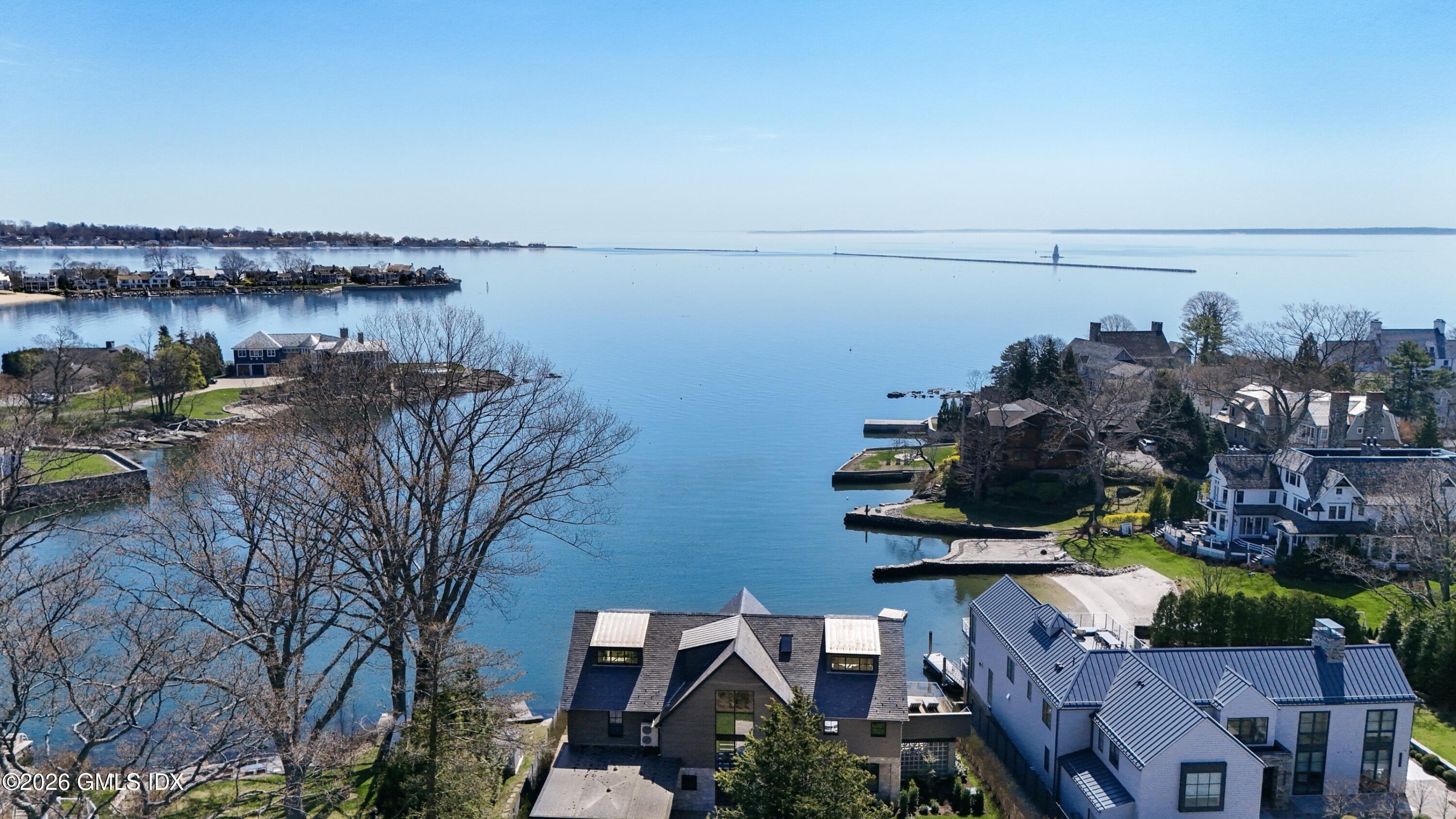 58 Shore Road Old Greenwich, CT 06870 - Photo 82 of 86 a view of a lake from balcony
